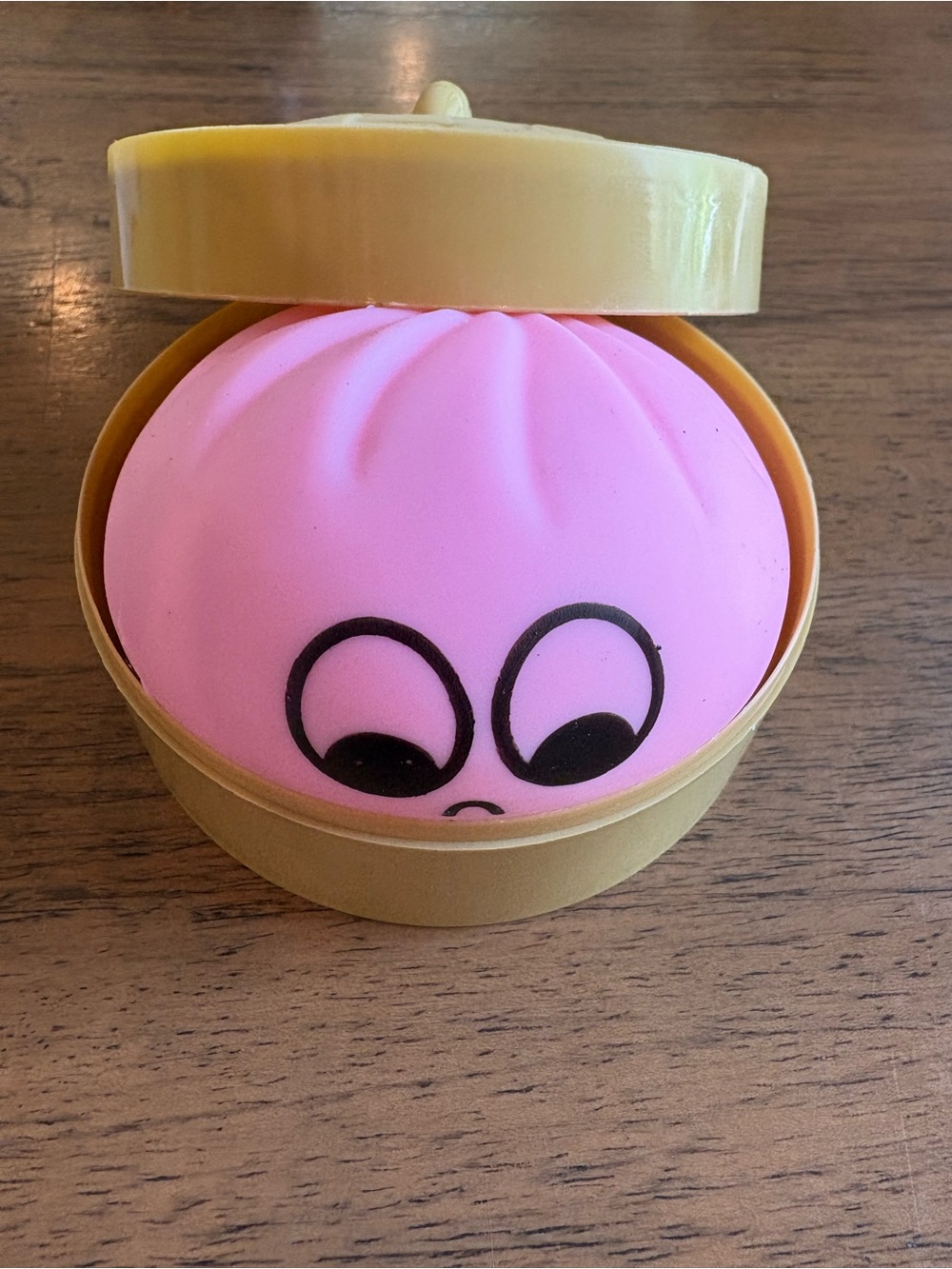 Pink Squeeze Toy in Tan Capsule